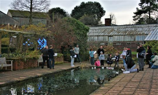 flotilla, origami boats, lit, paper boats, floating art, from London