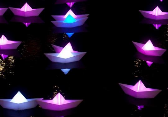 flotilla, origami boats, lit, paper boats, floating art, from London